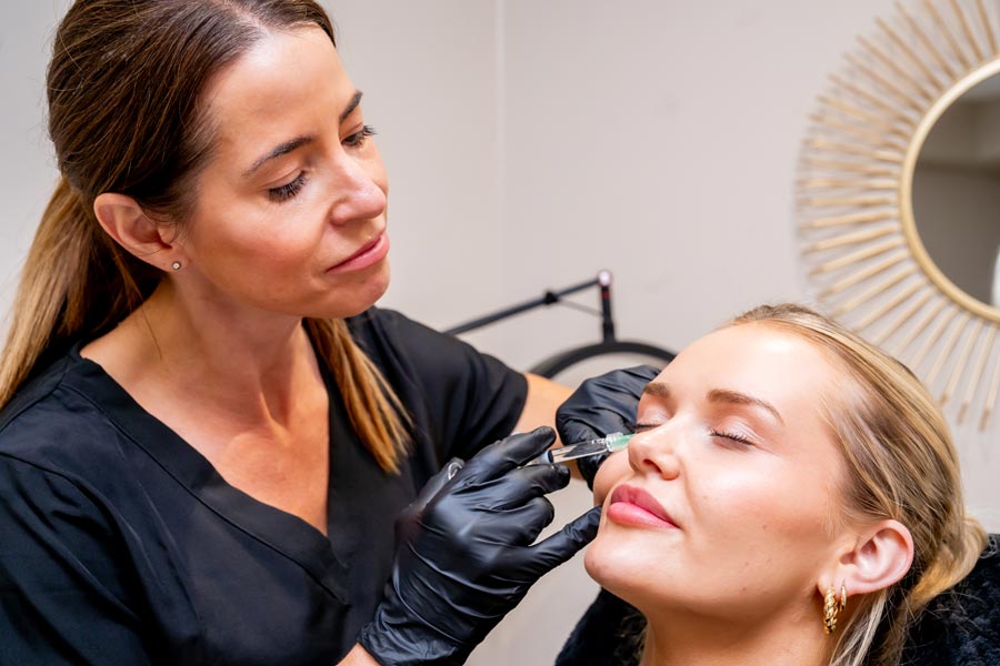 Zoe applying skin boosters